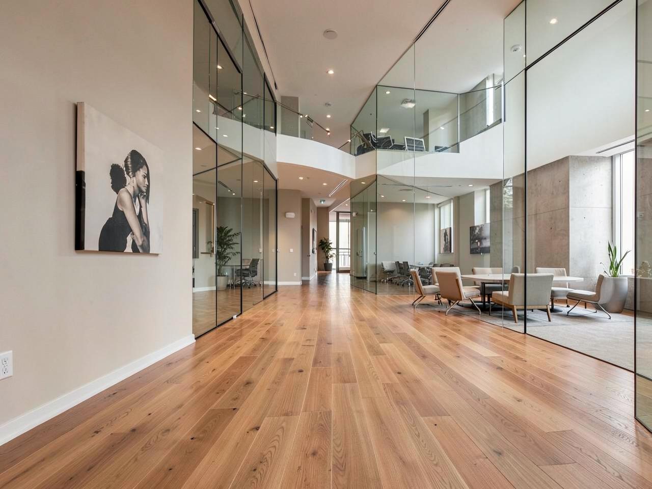 Commercial lobby with wood flooring and clean sightlines